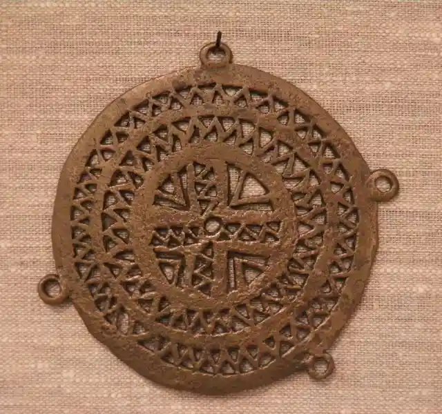 Bronze solar cross, solar disc